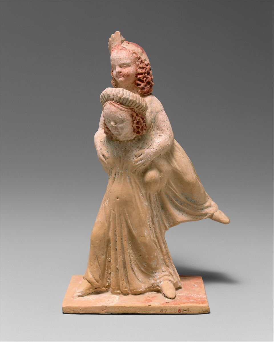 Terracotta group of two girls playing a game known as ephedrismos