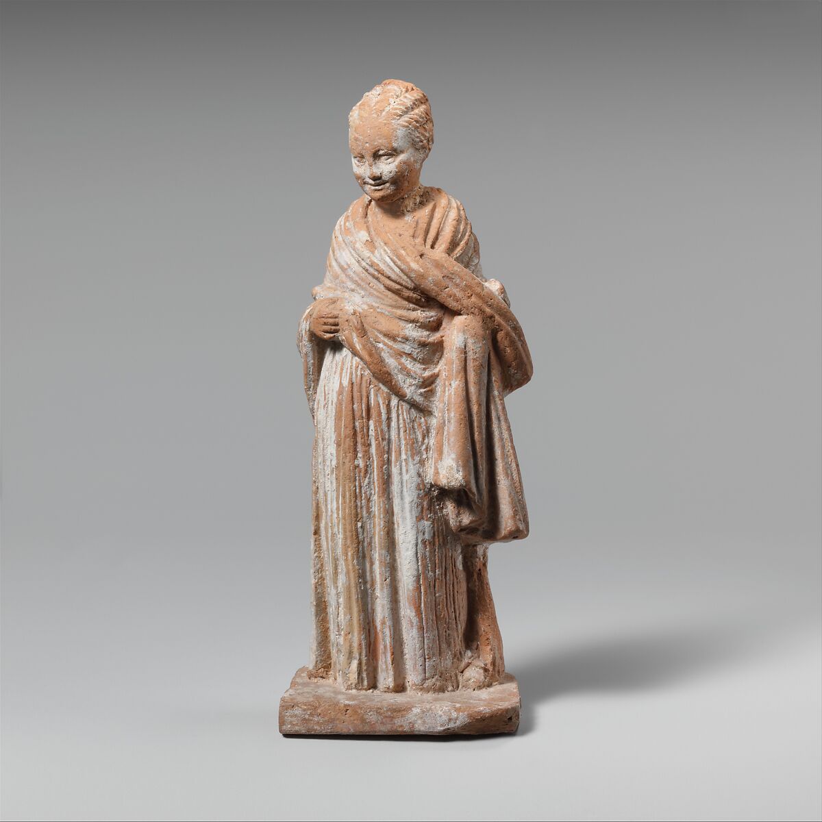 Terracotta statuette of a standing girl