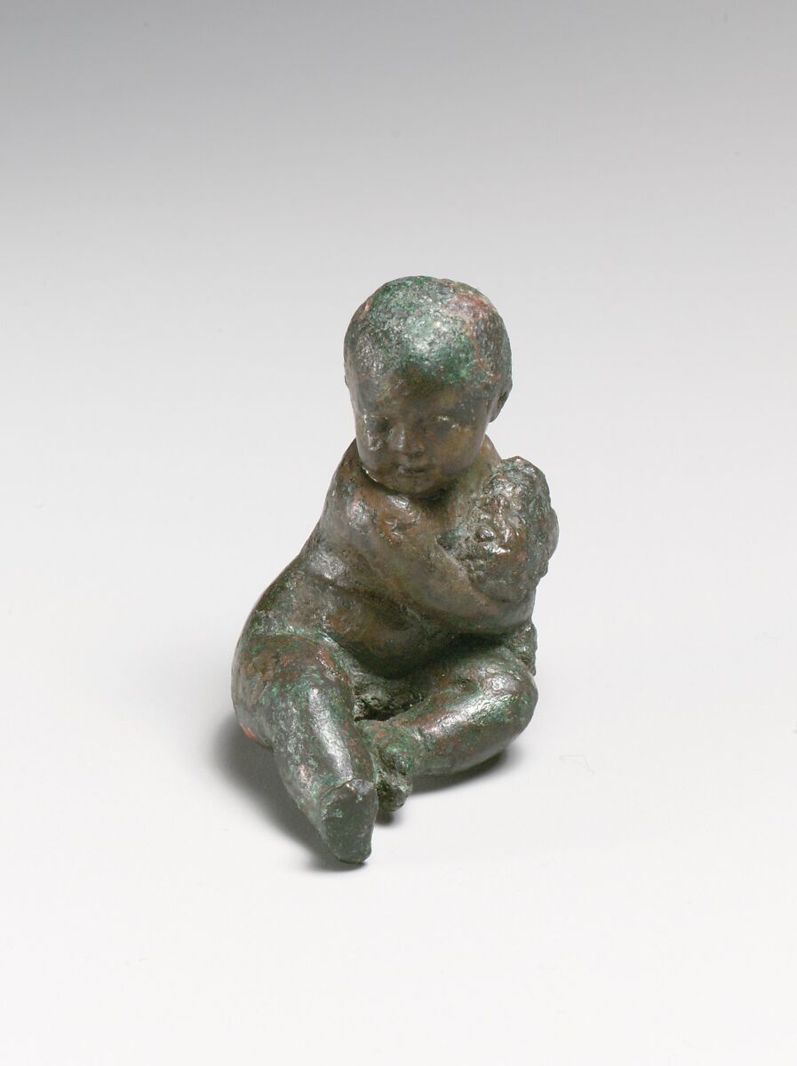 Bronze statuette of a child with a bunch of grapes, Bronze, Roman 