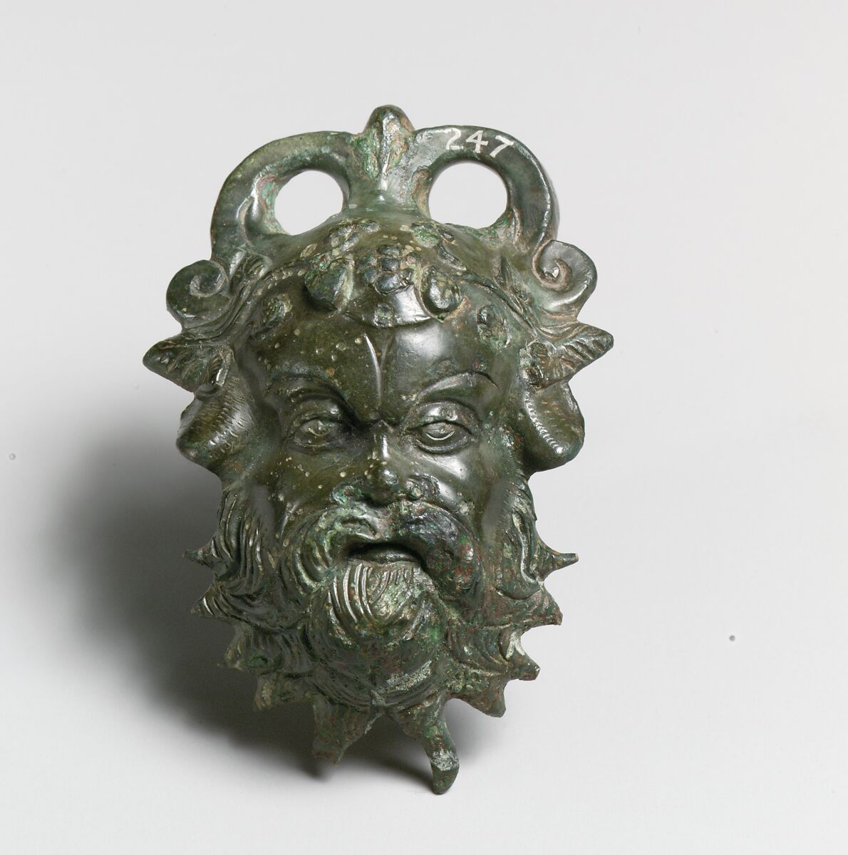 Bronze situla (pail) attachment in the form of a Silenos head, Bronze, Greek 