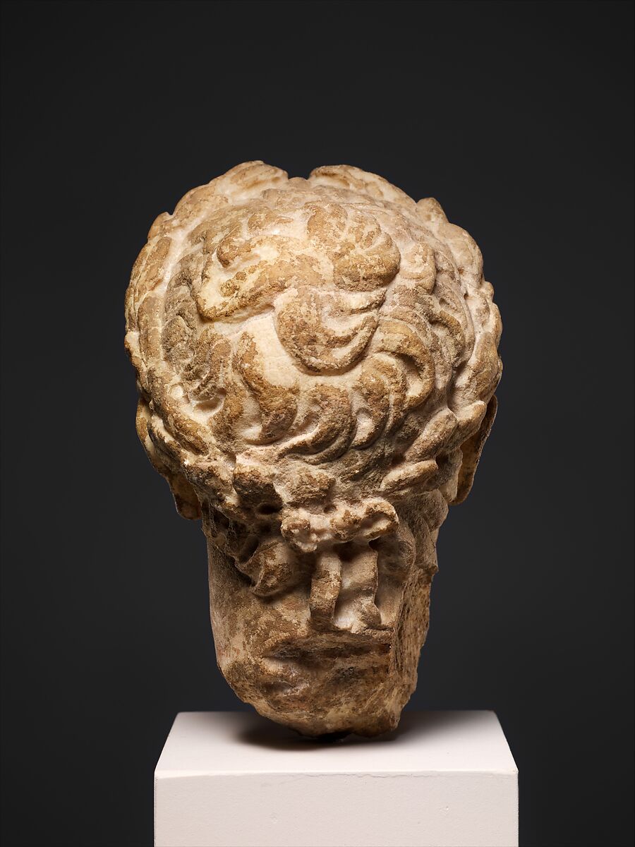 Marble head of a man wearing a laurel wreath, Marble, Roman