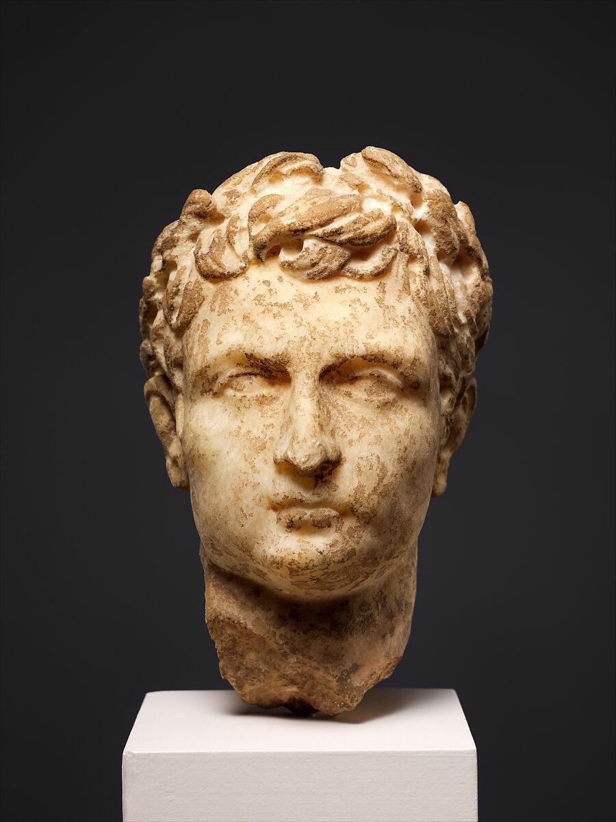 Marble head of a man wearing a laurel wreath, Marble, Roman 