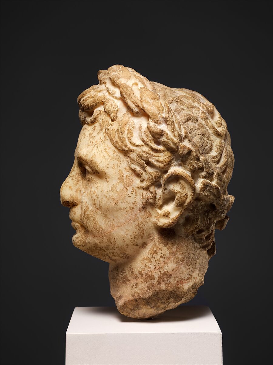 Marble head of a man wearing a laurel wreath, Marble, Roman