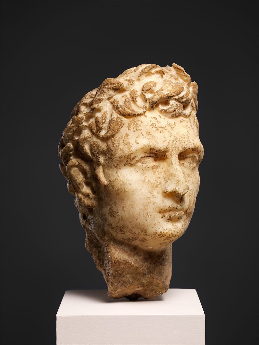 Marble head of a man wearing a laurel wreath, Marble, Roman