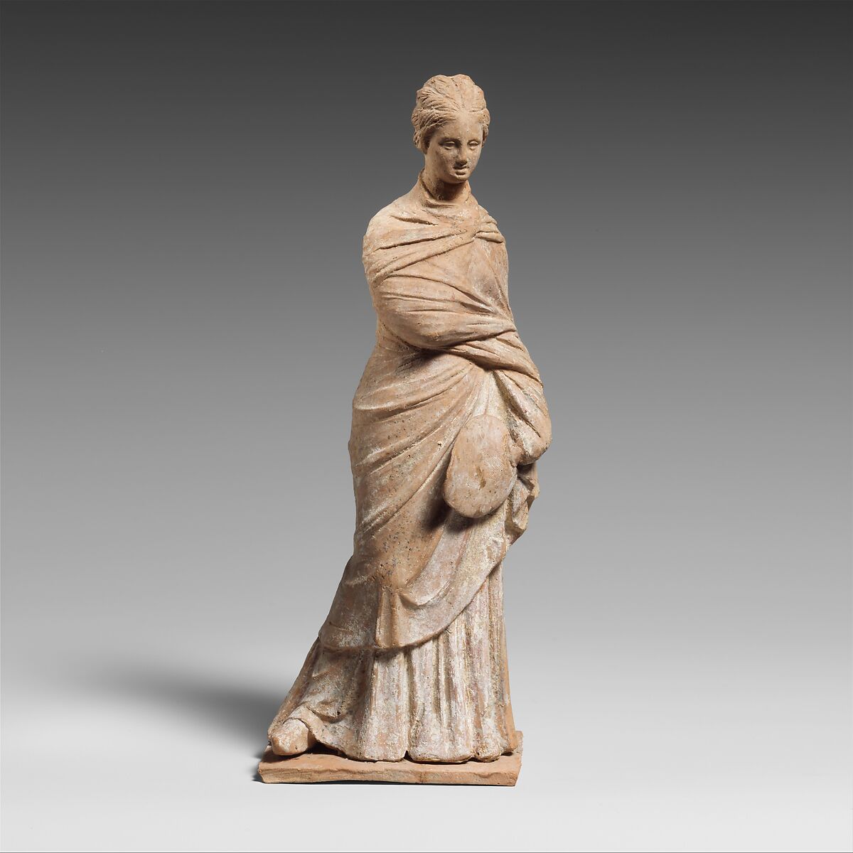 Terracotta statuette of a draped woman, Terracotta, Greek, Attic 