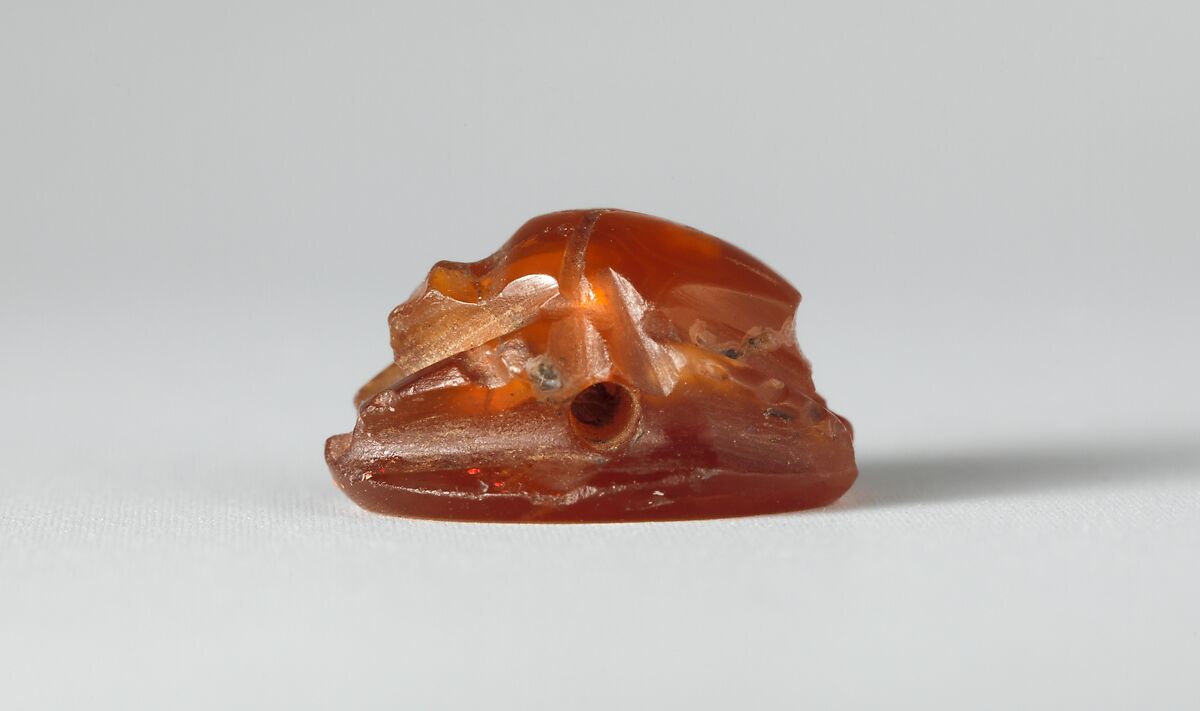 Carnelian scarab: Harpocrates with cornucopia, Carnelian, Roman
