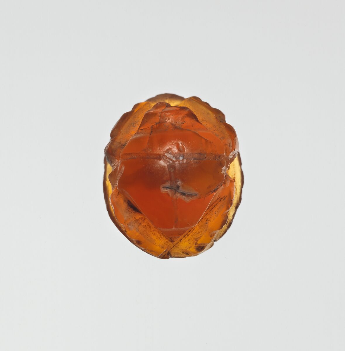 Carnelian scarab: Harpocrates with cornucopia, Carnelian, Roman