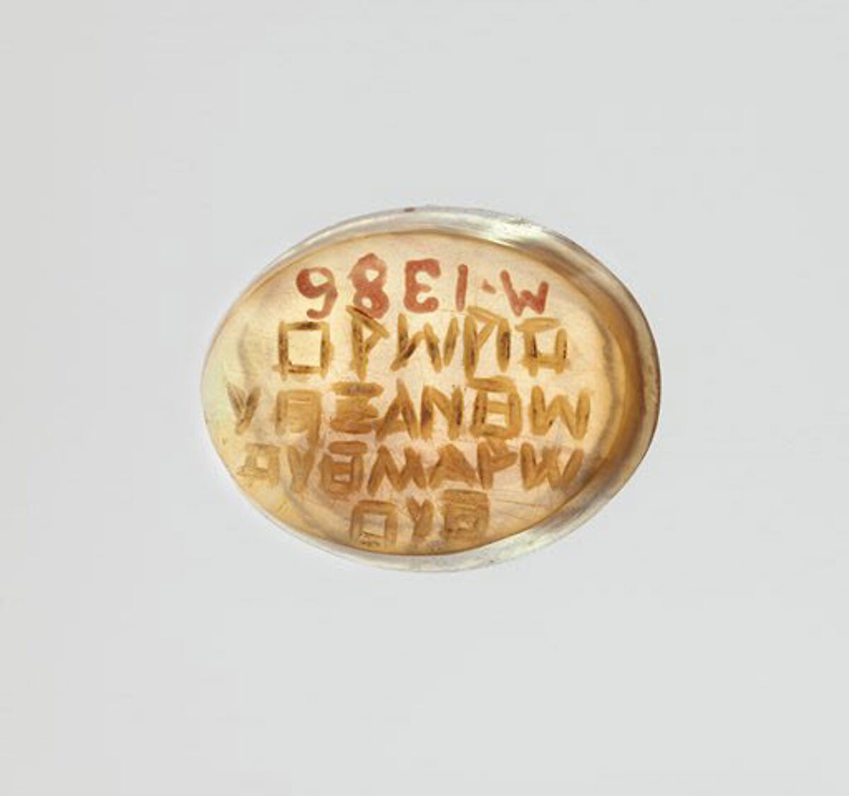 Agate intaglio: Uterine symbol, Agate, Roman