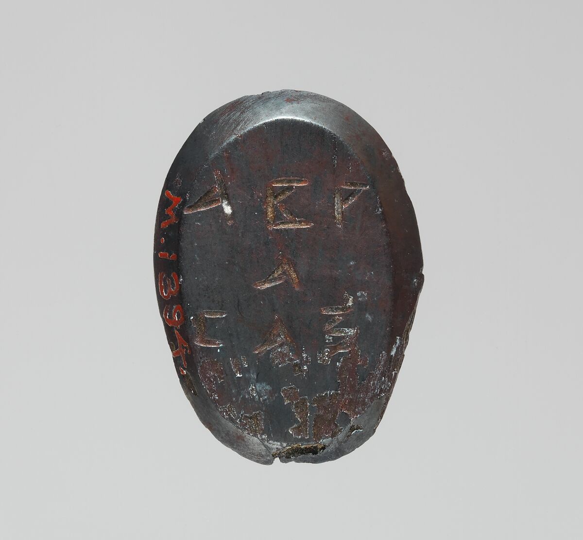 Haematite intaglio: Winged Genius, Haemaetite, Roman