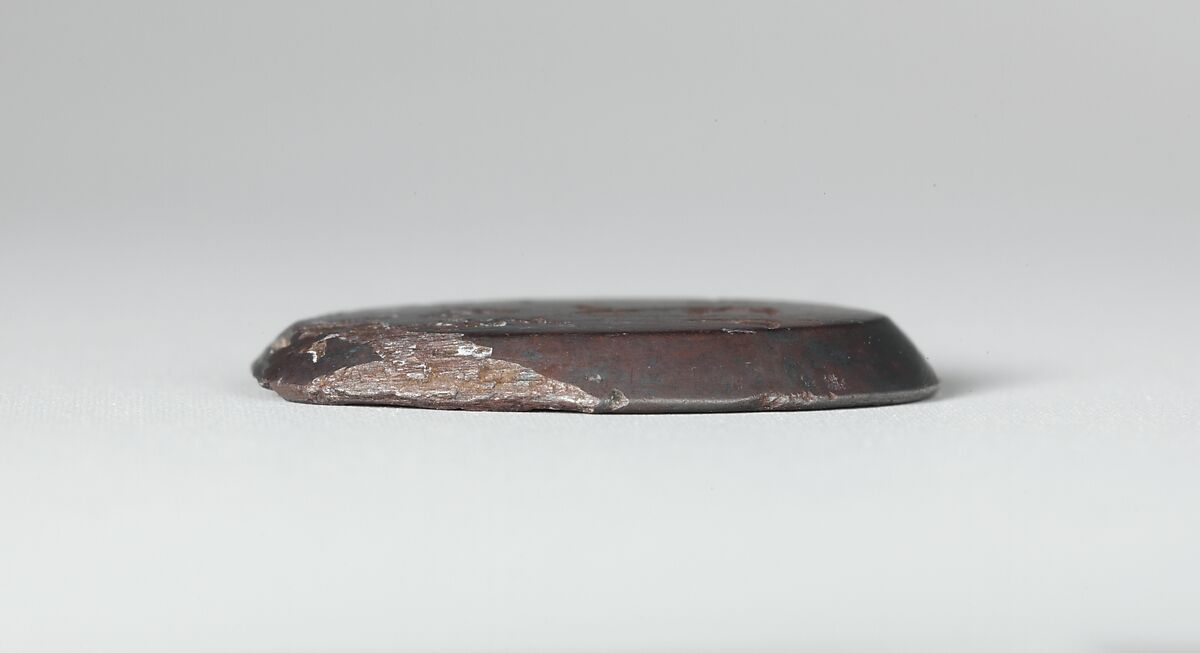 Haematite intaglio: Winged Genius, Haemaetite, Roman
