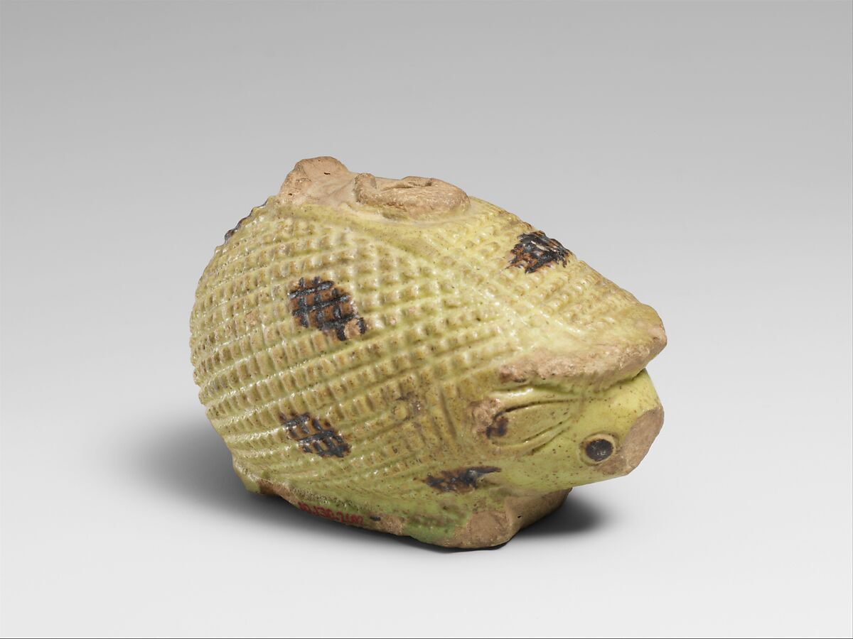 Faience aryballos (oil bottle) in the form of a hedgehog, Faience, East Greek 