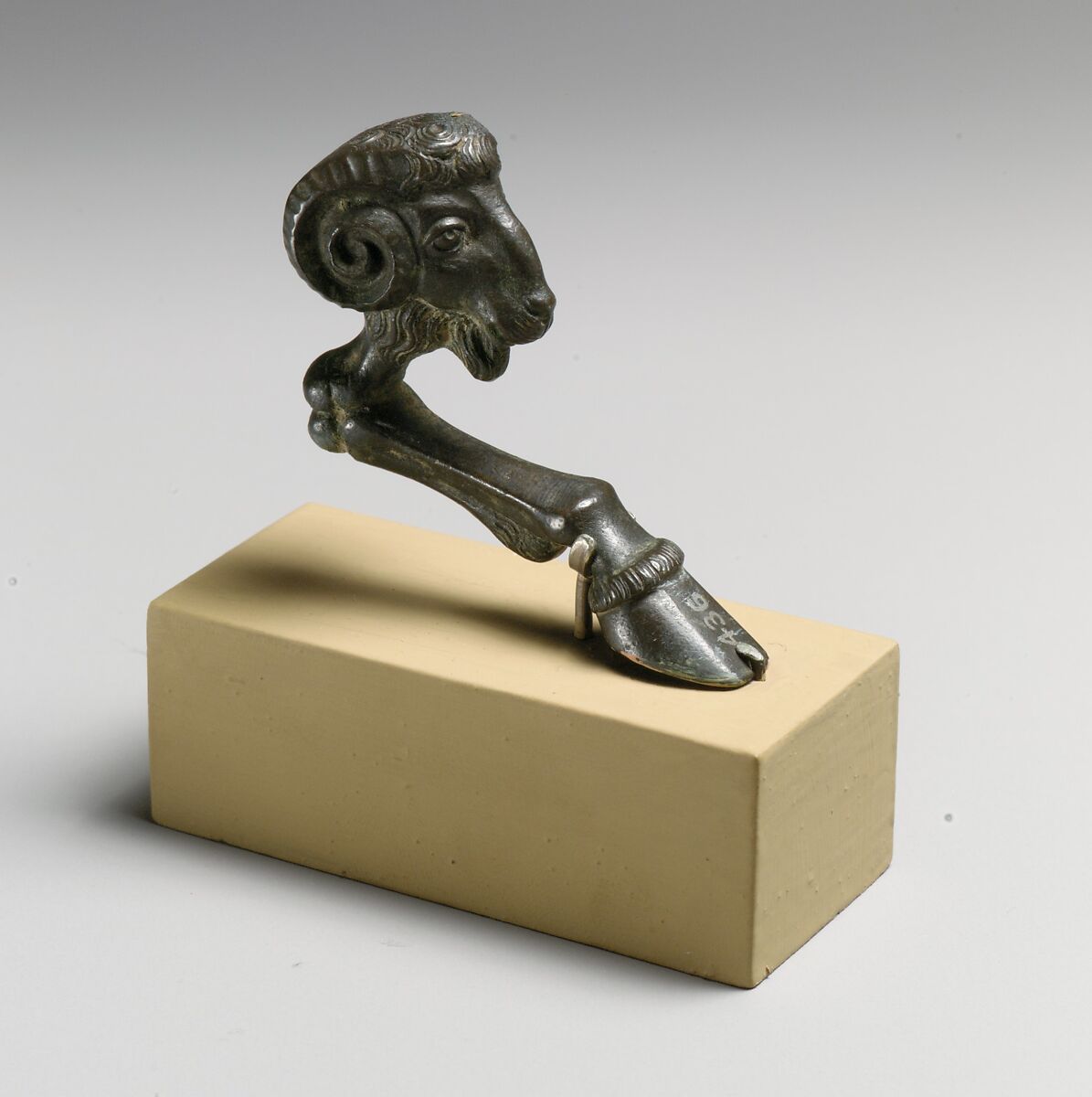 Bronze support in the form of a ram's head and foreleg, Bronze, Roman 