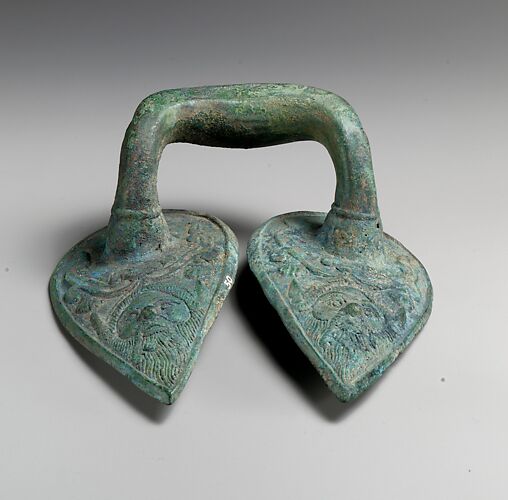 Bronze handle of a vessel with Silenos mask