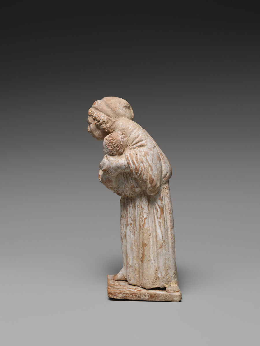 Terracotta statuette of an old nurse holding a child, Terracotta, Greek, Attic or Boeotian