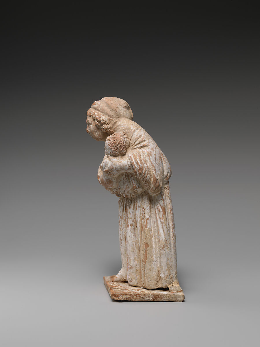 Terracotta statuette of an old nurse holding a child, Terracotta, Greek, Attic or Boeotian