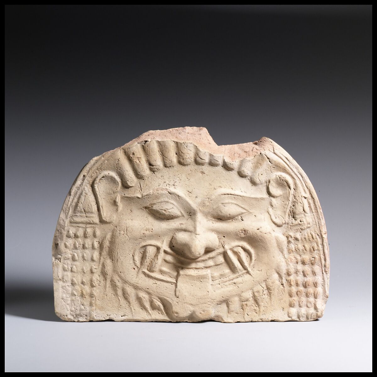 Terracotta gorgoneion antefix (roof tile), Terracotta, Greek 