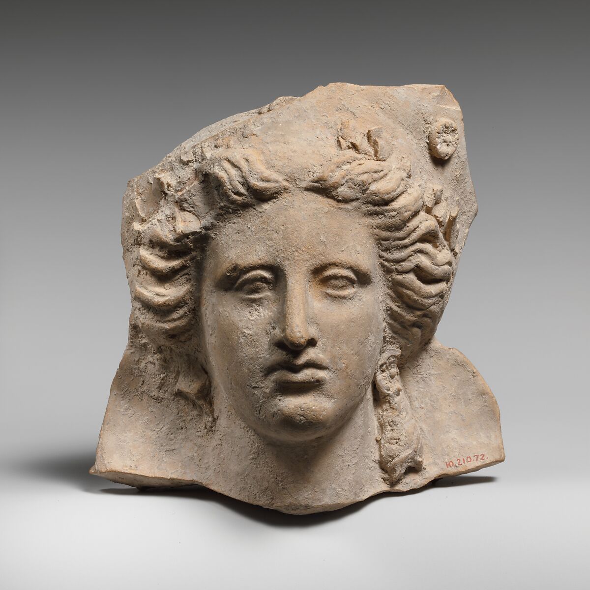Head of a woman, Terracotta, Greek, South Italian, Tarentine 