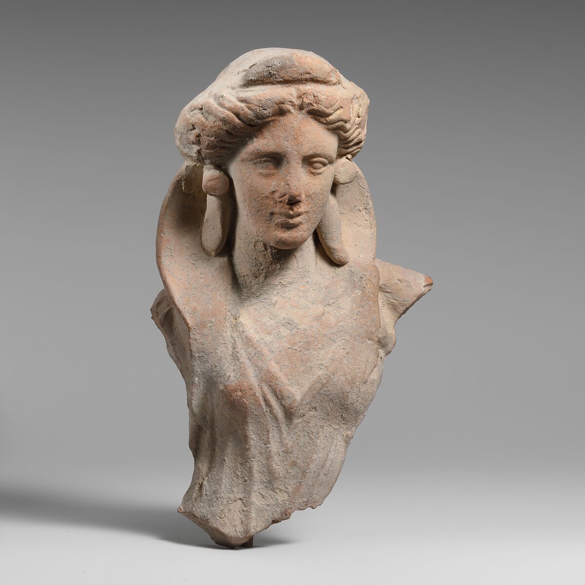 Terracotta fragment of the upper body of a woman, Terracotta, Greek, South Italian, Tarentine 