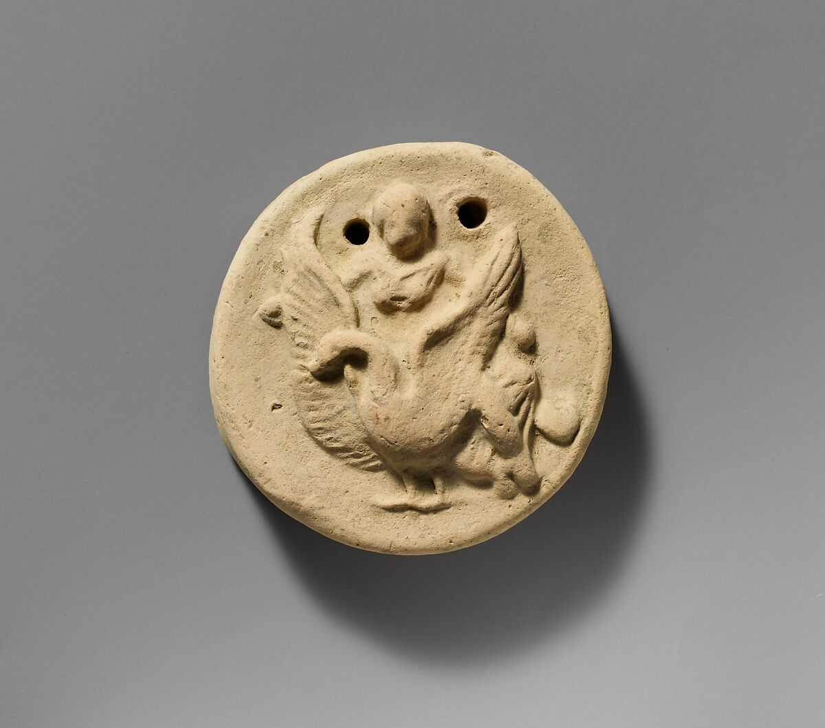 Terracotta disk with Aphrodite riding on a swan, Terracotta, Greek 