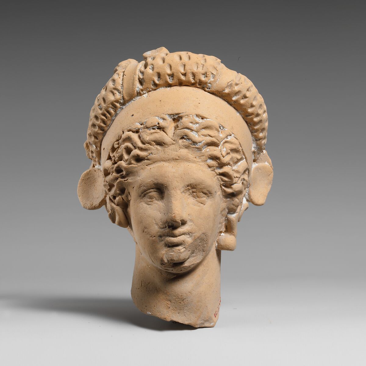 Terracotta head of a youth, Terracotta, Greek, South Italian, Tarentine 