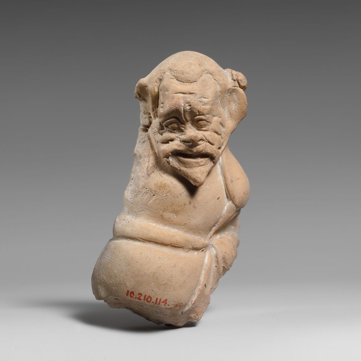 Terracotta fragment of a male figure, Terracotta, Greek, South Italian, Tarentine 