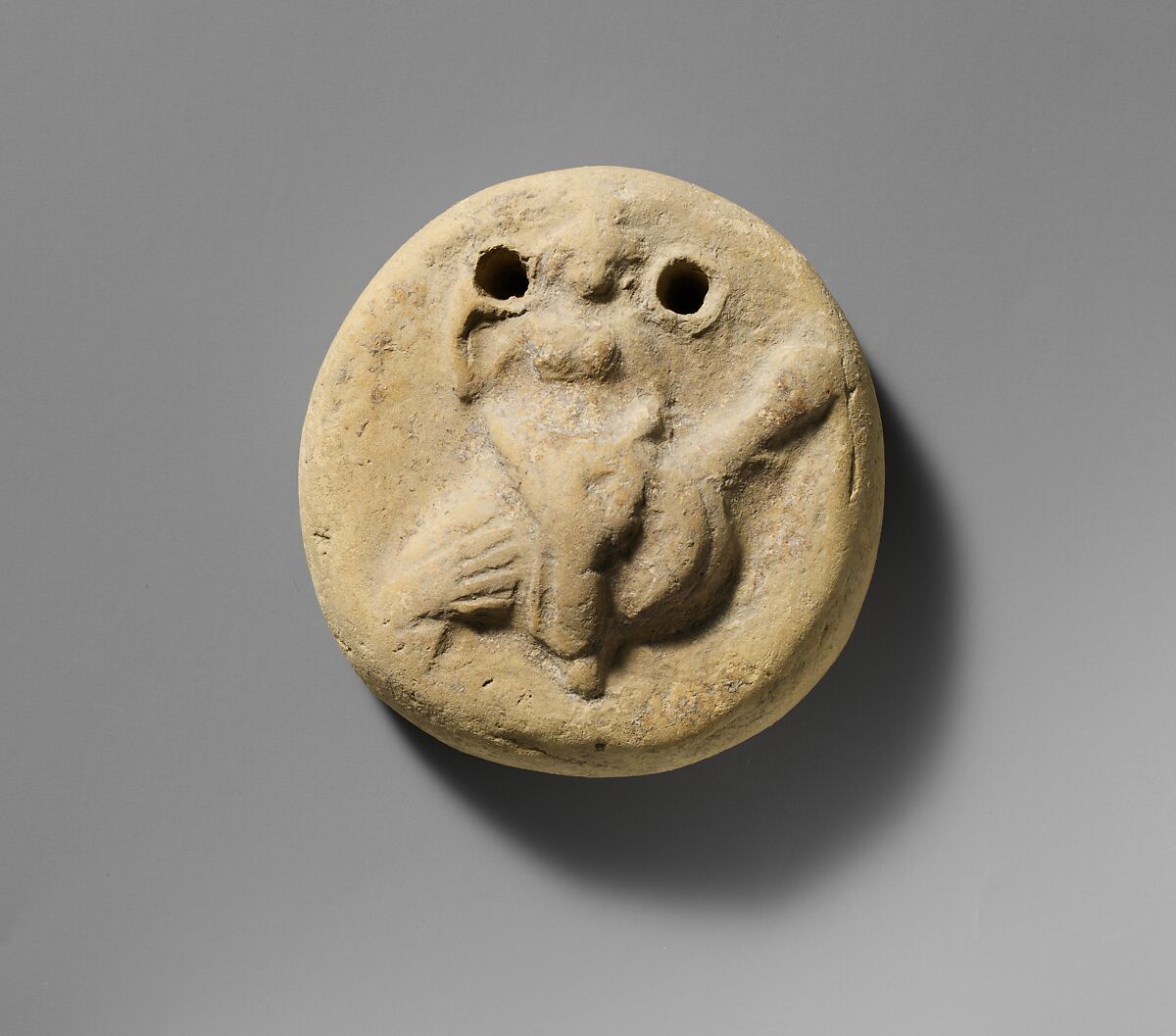 Terracotta disk with Aphrodite riding on a goose, Terracotta, Greek 