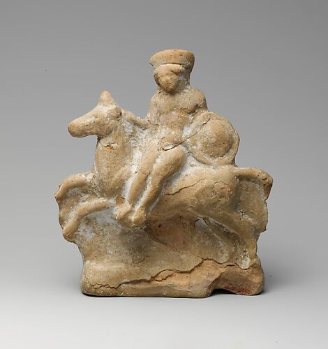 Terracotta statuette of a man seated on a horse