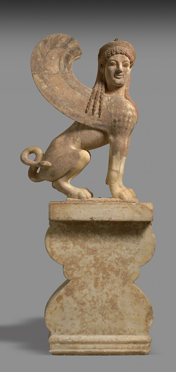 Marble capital and finial in the form of a sphinx