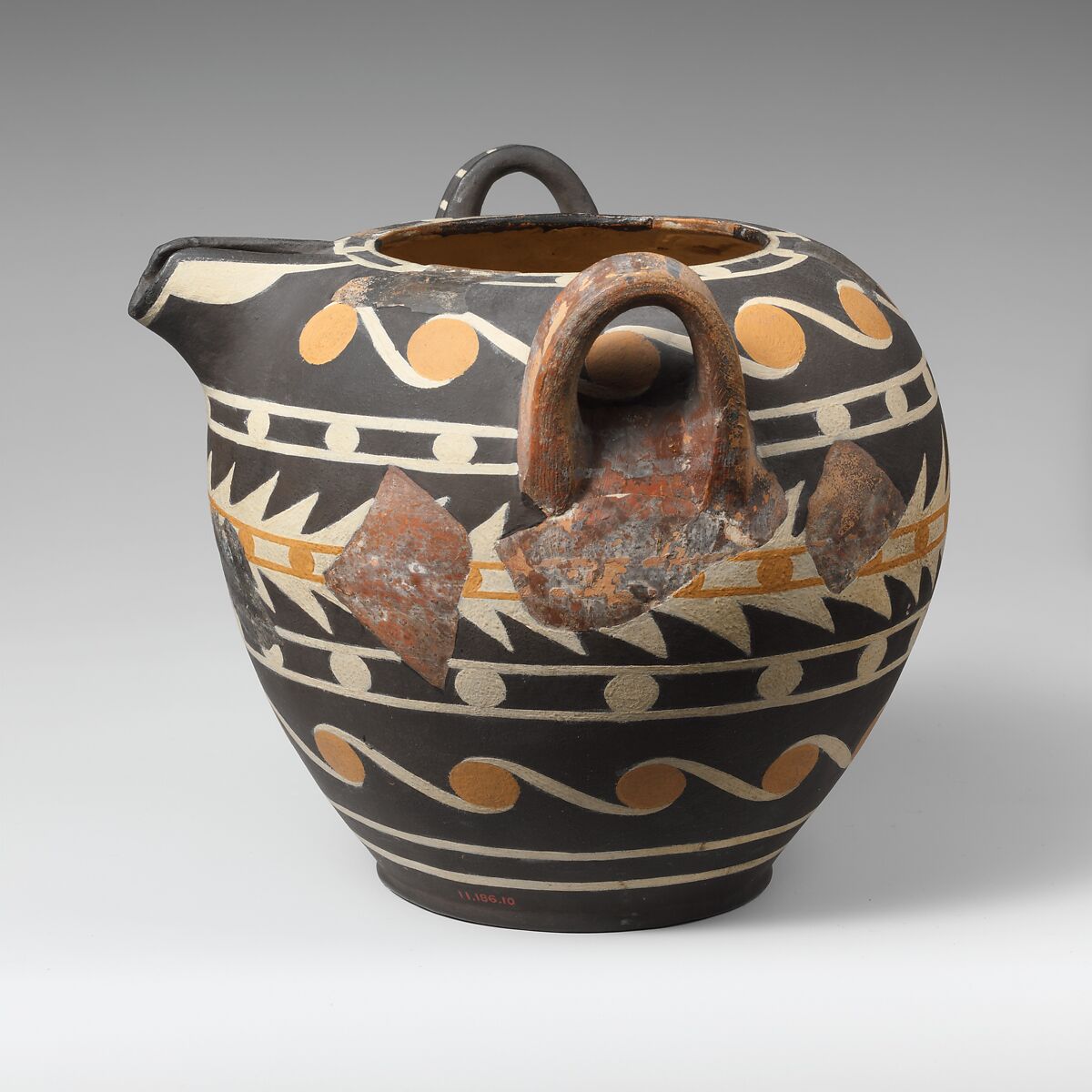 Terracotta bridge-spouted jar, Terracotta, Minoan 