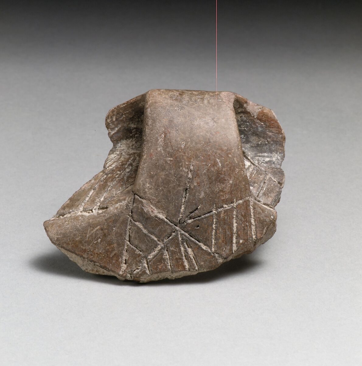 Terracotta rim fragment with handle and incised decoration, Terracotta, Cretan 