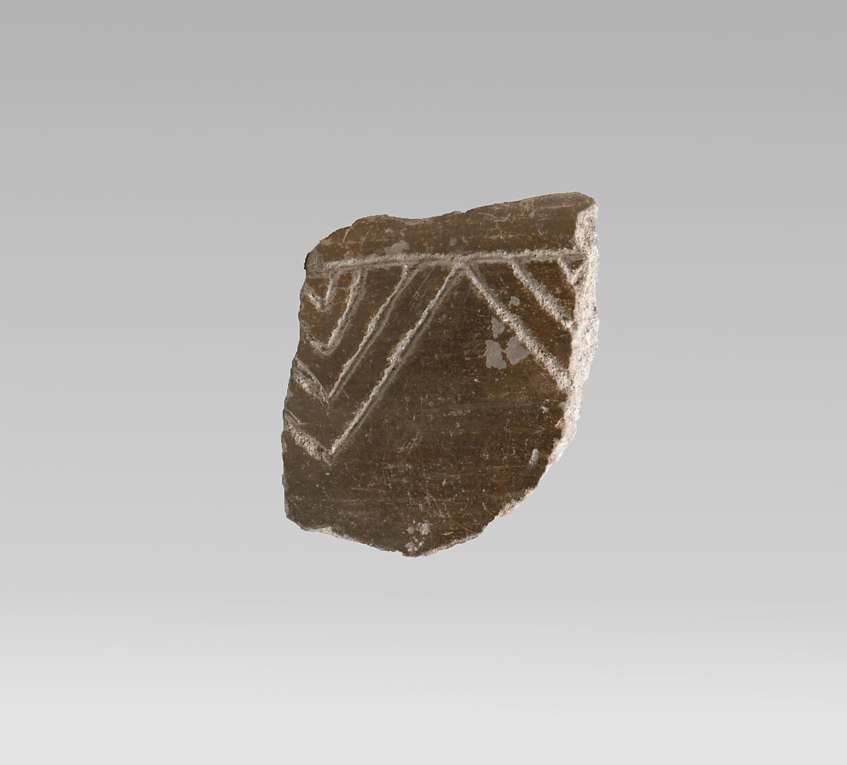 Terracotta vessel fragment with incised decoration, Terracotta, Cretan 