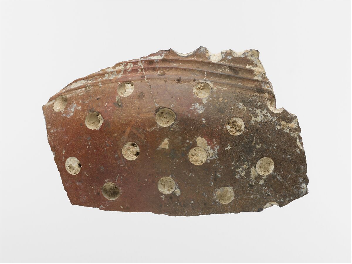 Terracotta vase fragment with white inlay, Terracotta, Minoan 