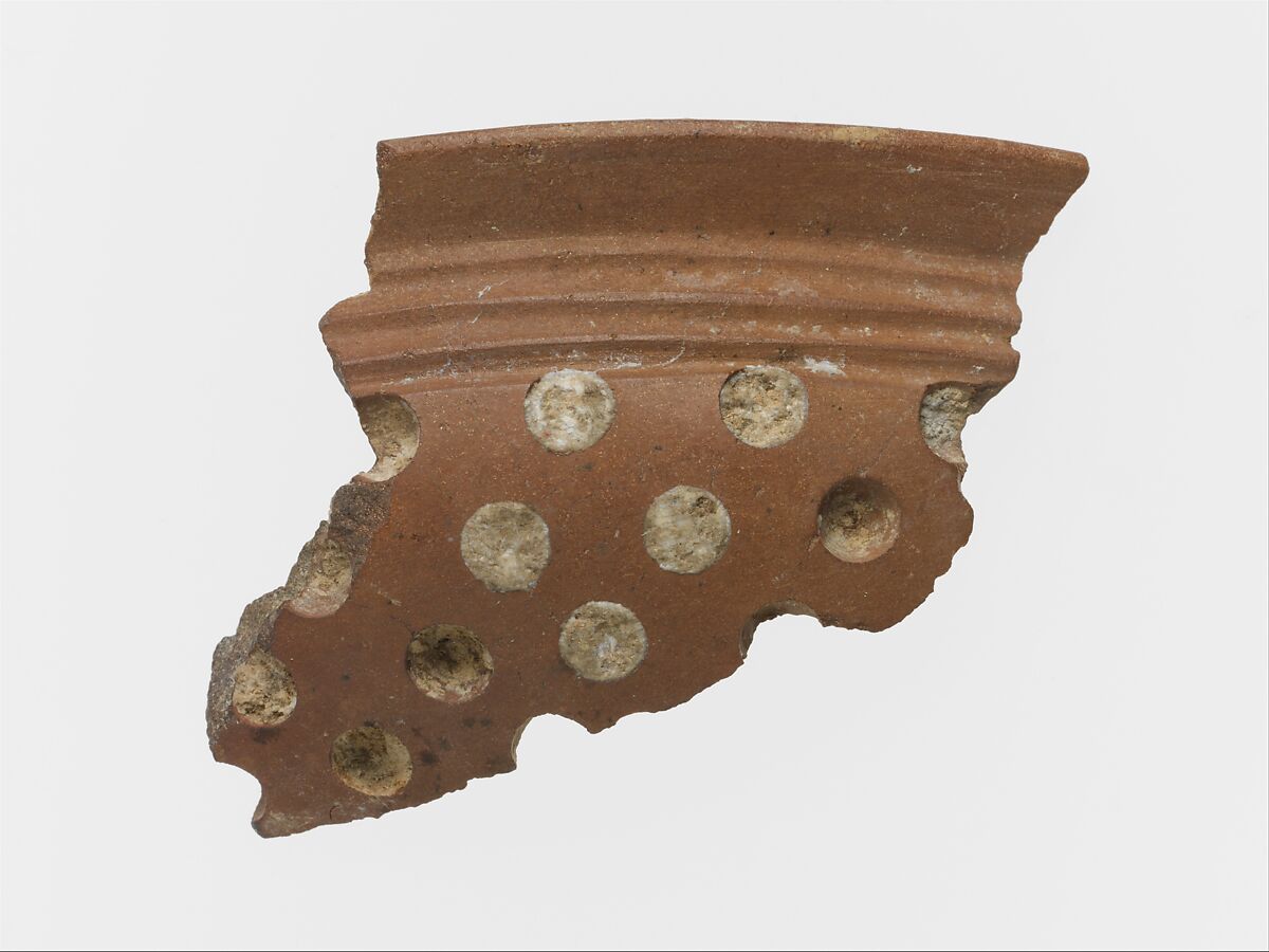 Terracotta rim fragment with white inlay, Terracotta, Minoan 