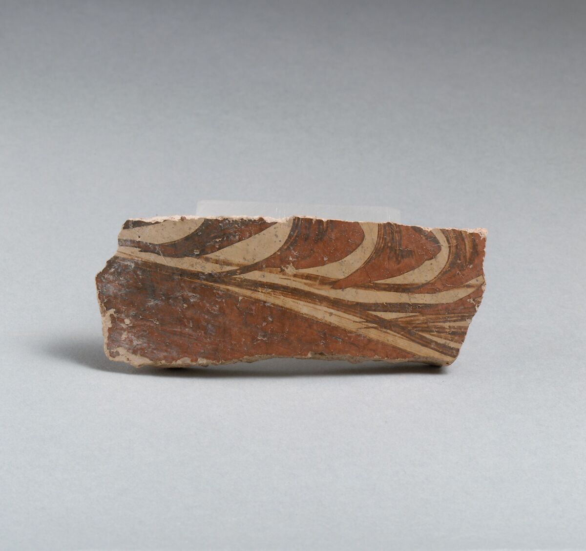 Terracotta vessel fragment with grass motif, Terracotta, Minoan 