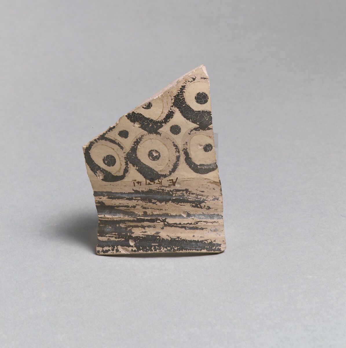 Terracotta rim from a vase with bands and dots in circles, Terracotta, Minoan 