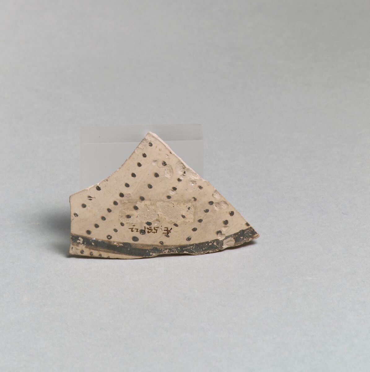 Terracotta vessel fragment with rows of dots and band, Terracotta, Minoan 
