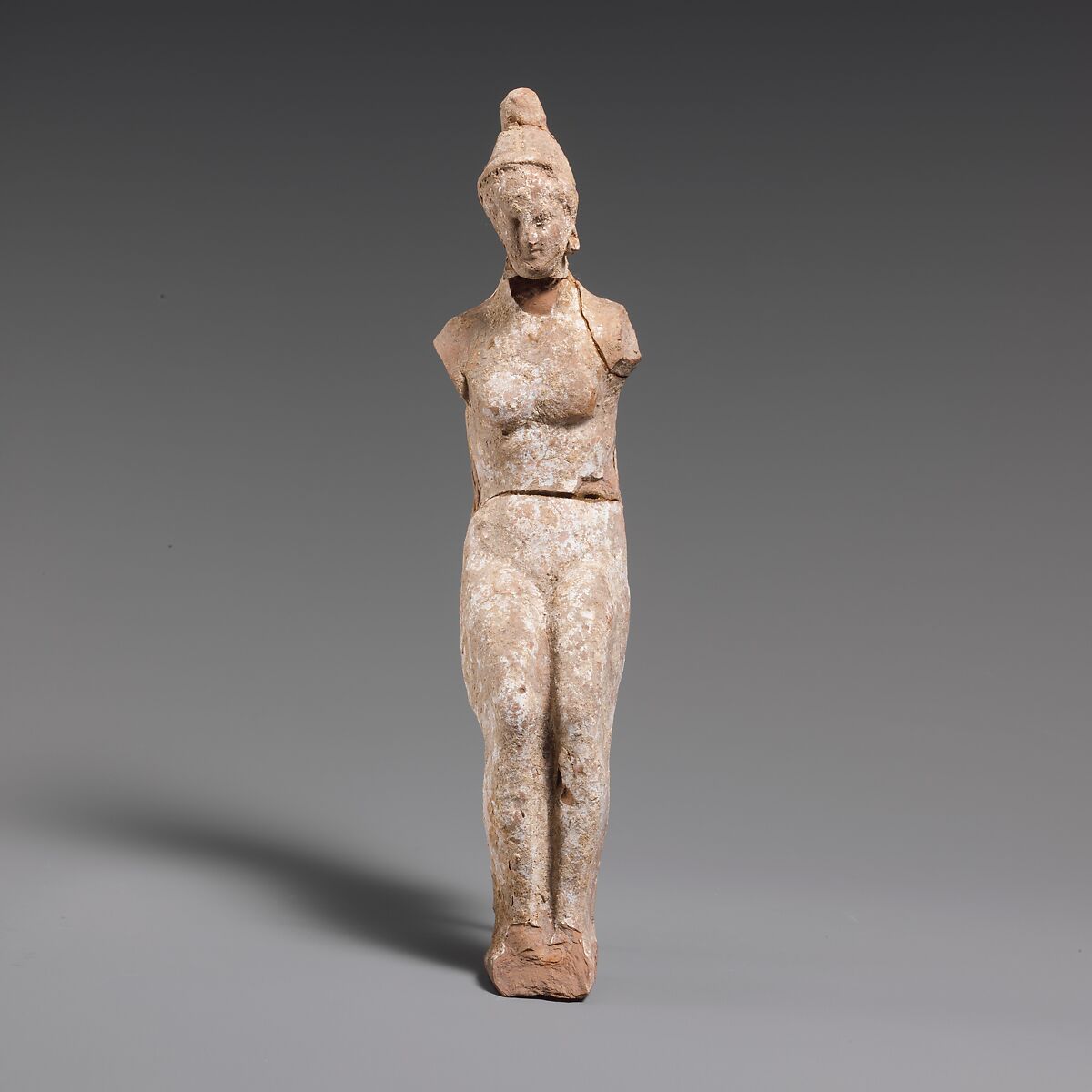 Terracotta statuette of a doll, Terracotta, Greek, South Italian, Tarentine 