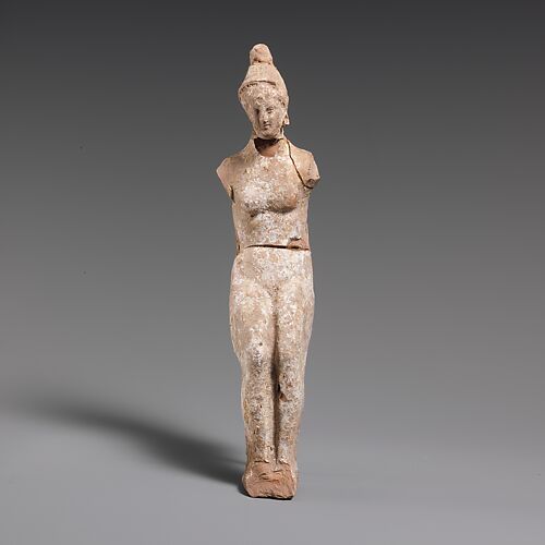 Terracotta statuette of a doll