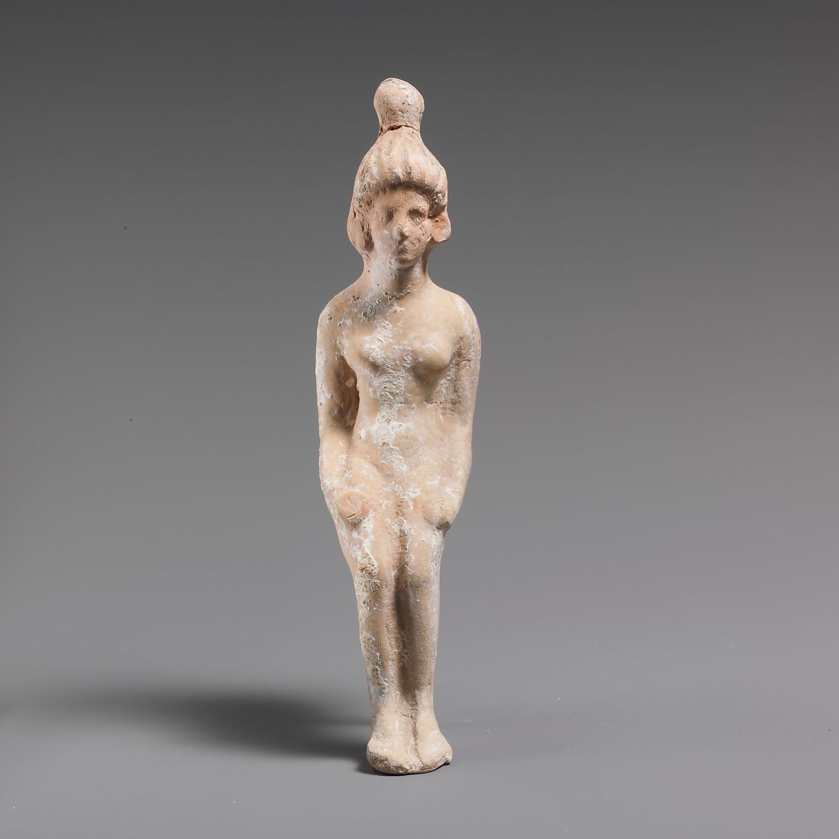Terracotta statuette of a seated doll, Terracotta, Greek, South Italian, Tarentine 