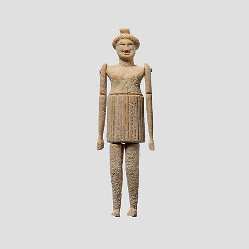 Bone figurine with articulated limbs
