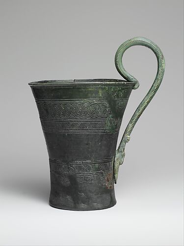 Silver kyathos (ladle) with bronze handle
