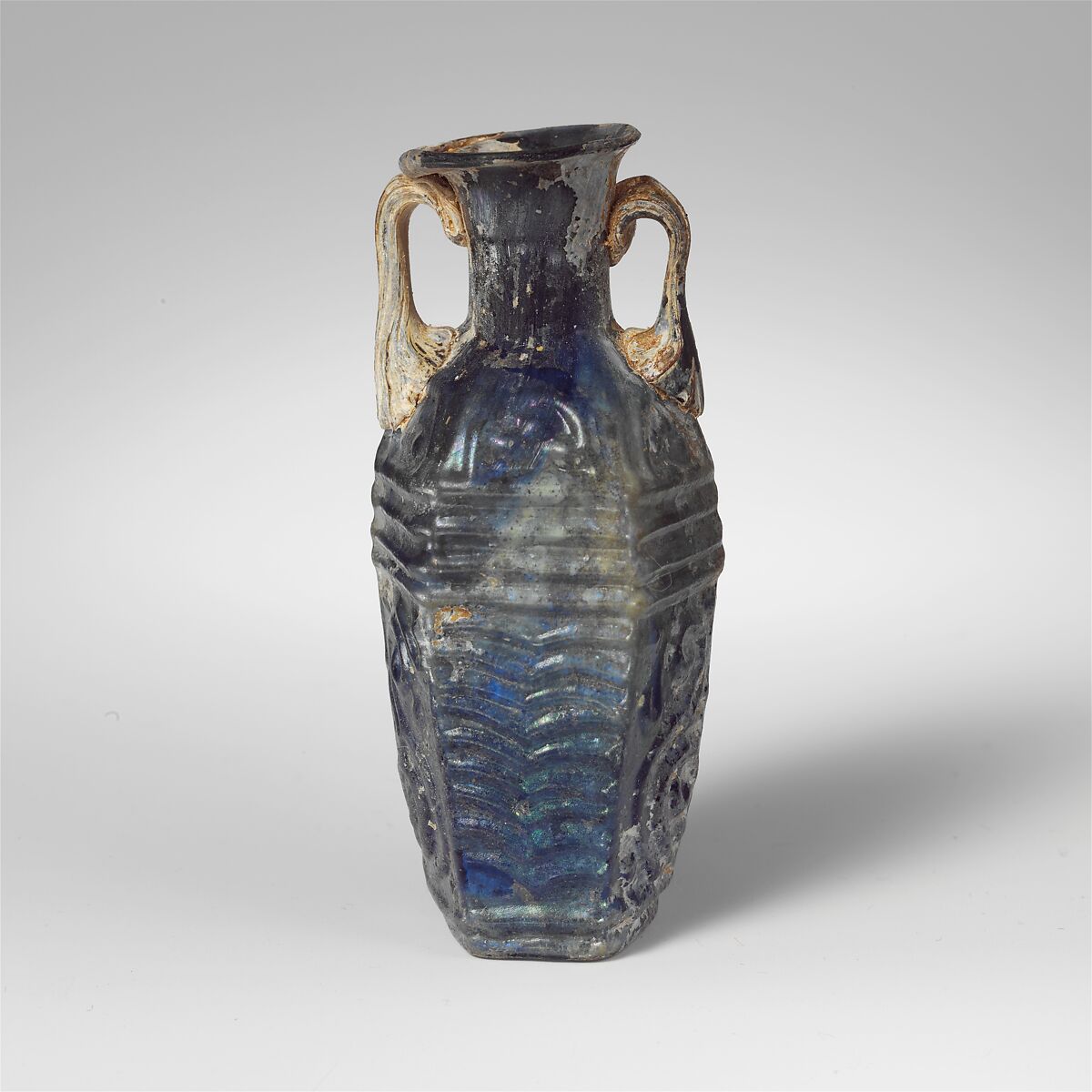 Glass hexagonal bottle, Glass, Roman 