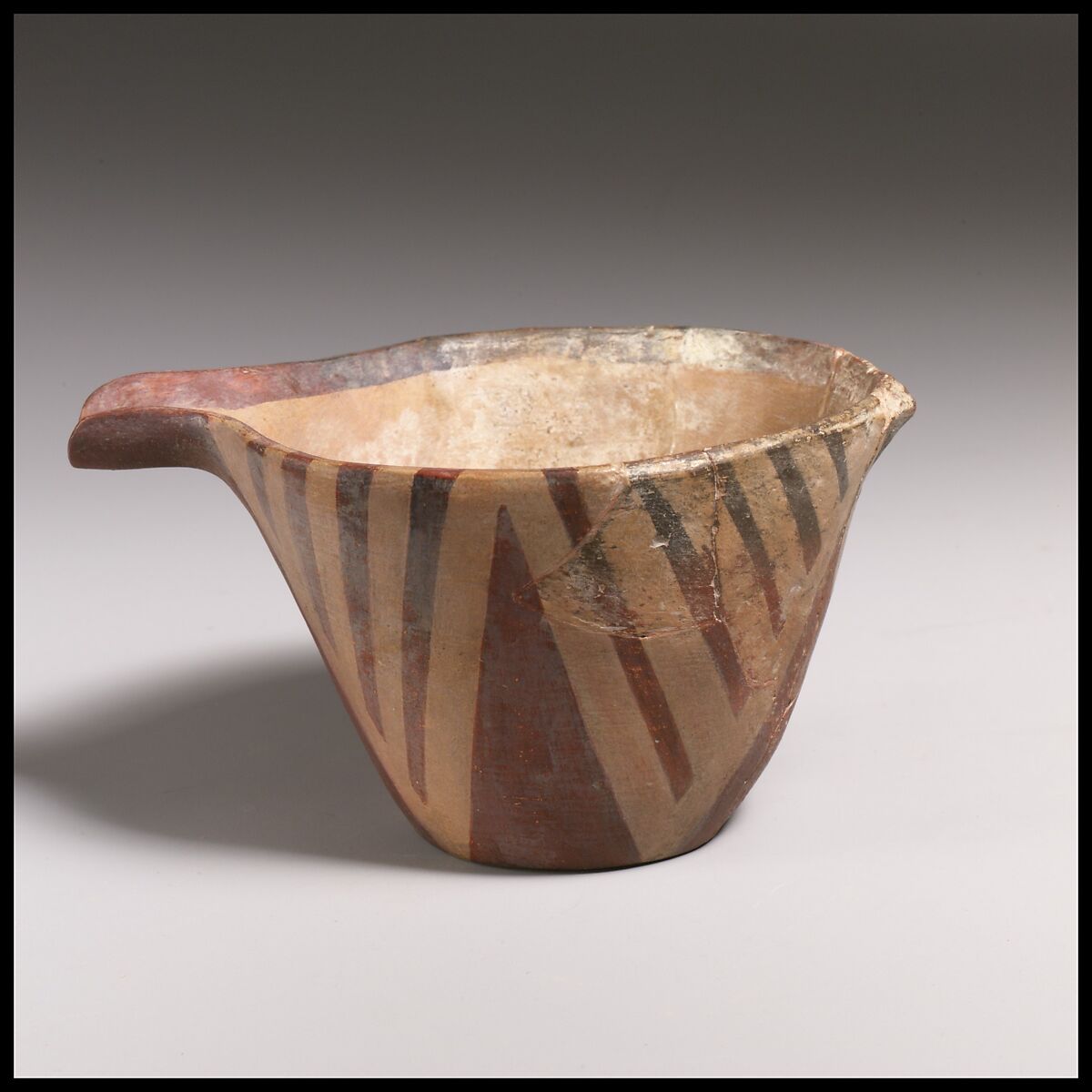 Terracotta spouted conical bowl, white-on-dark ware, Terracotta, Minoan