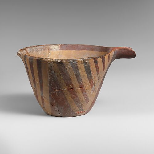 Terracotta spouted conical bowl, white-on-dark ware