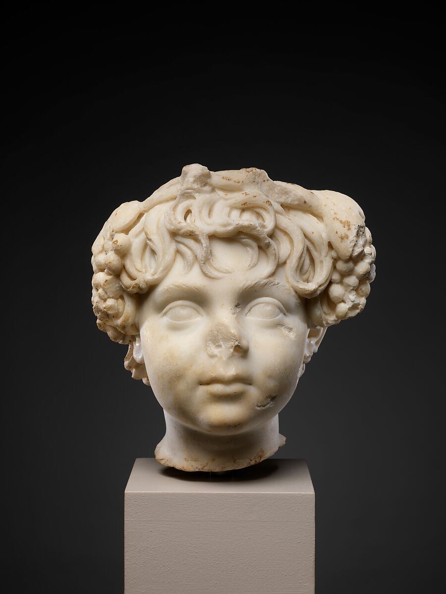 Marble head of a boy wearing a wreath, Marble, Roman 