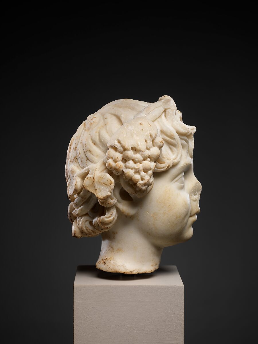 Marble head of a boy wearing a wreath, Marble, Roman