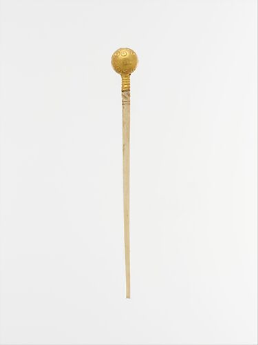 Ivory and gold pin