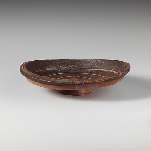 Shallow terracotta bowl