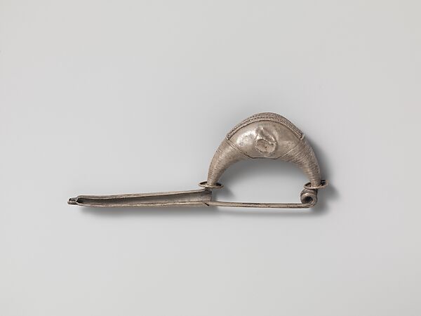 Silver navicella-type fibula (safety pin)