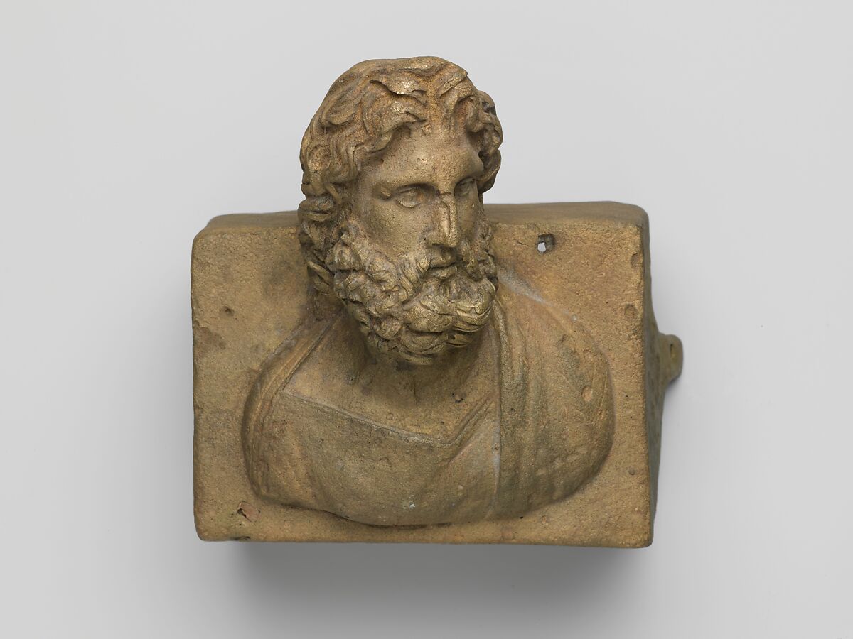 Bronze fitting decorated with a bust of Neptune, Bronze, Roman 